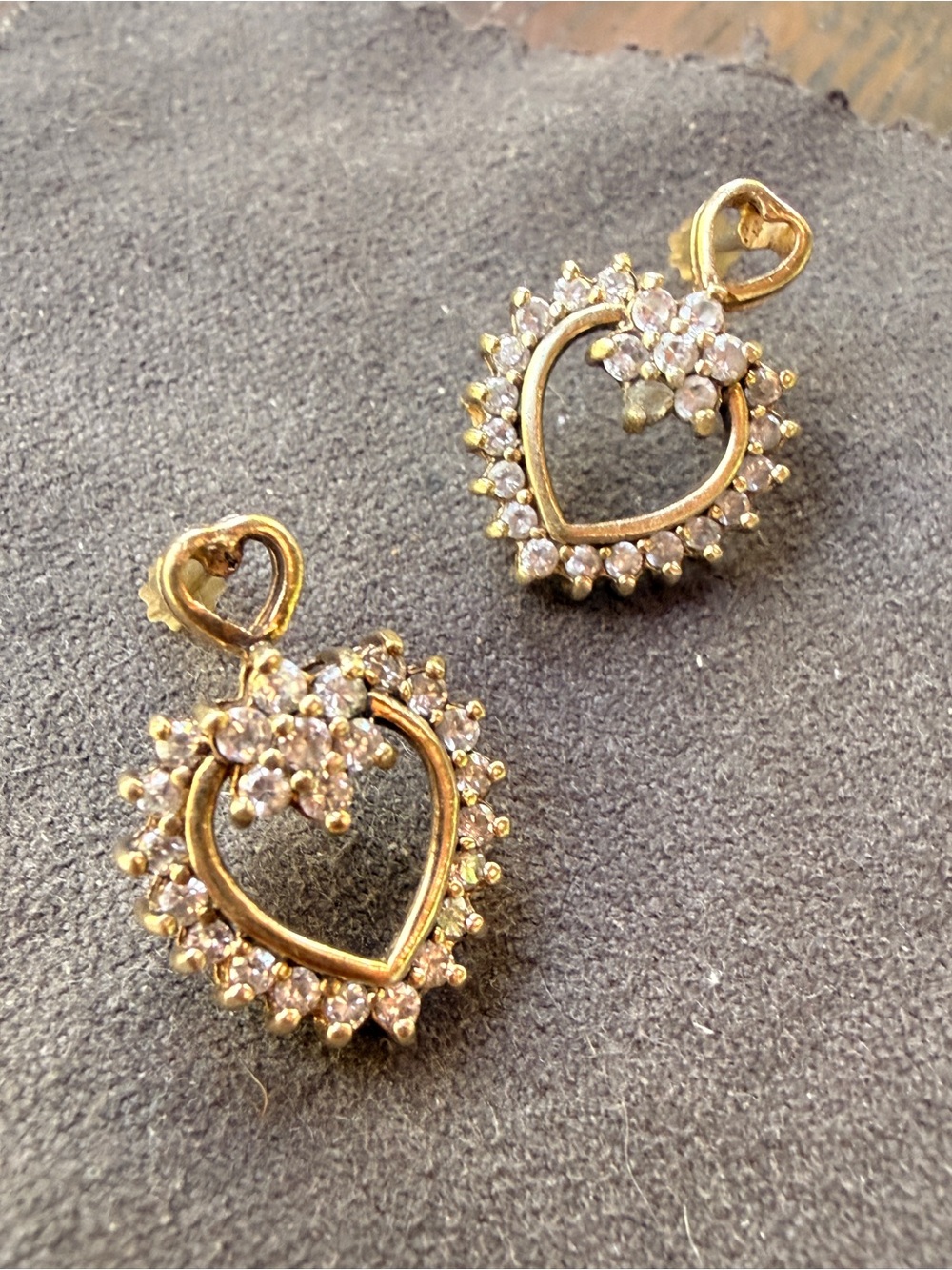Vintage Diamonique 925 heart earrings featuring a yellow gold plating .